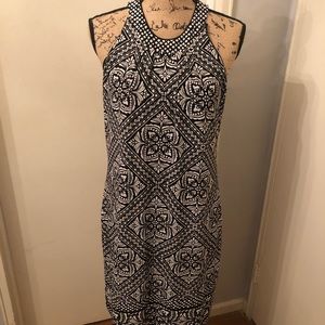 Sleeveless patterned black dress size Medium